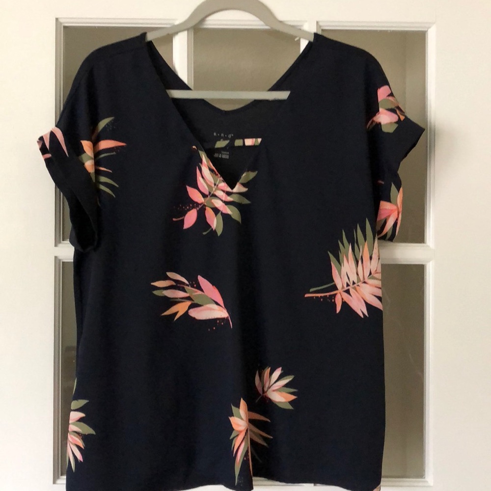 Navy blue top with Hawaiian floral pattern.